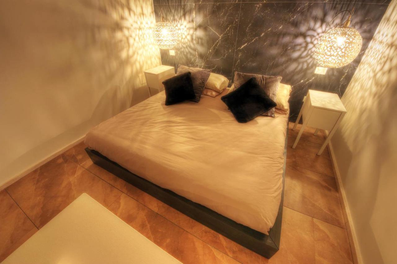 Urban Central Suites Кальяри Экстерьер фото